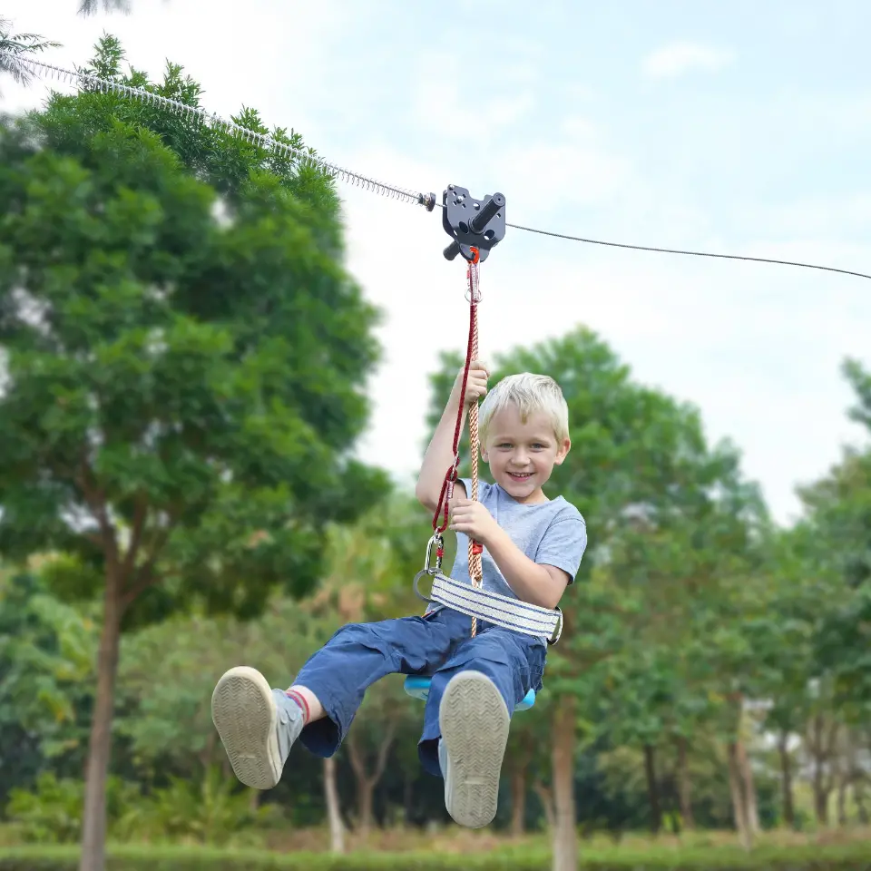 Kid riding backyard zipline