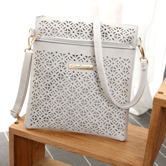 Blossomita Handbag With Cutout Flower Design - Picture 7 of 22